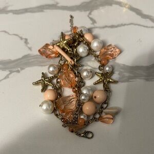 Gold and Peach Starfish Multi Strand Charm Bracelet